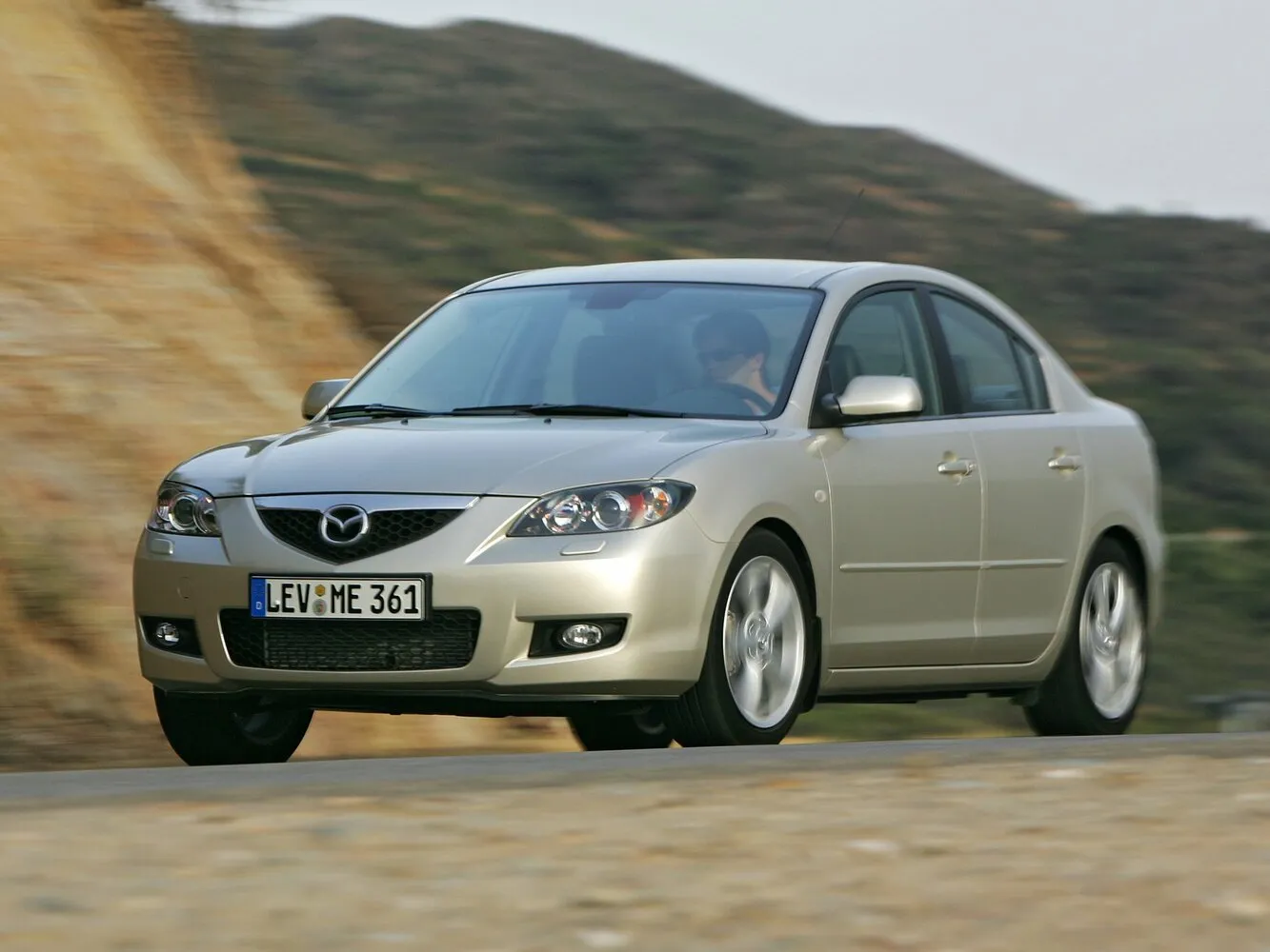 Mazda 3 1.6 AT (105 л.с.)